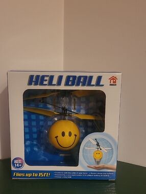 Heli Ball Smiley Face Flying Toy - Yellow. DON'T Use Outside Will Fly Away.